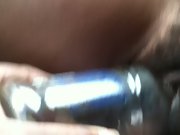 Insertion massive bottle into creamy unshaved pussy